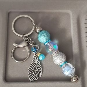 🤘 Hand Beaded Icey Peacock Keychain Silver Glitter Powder Blue Lobster Clasp 4"